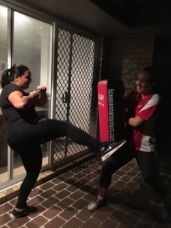 Chloe Personal Trainer Kickboxing kick shield